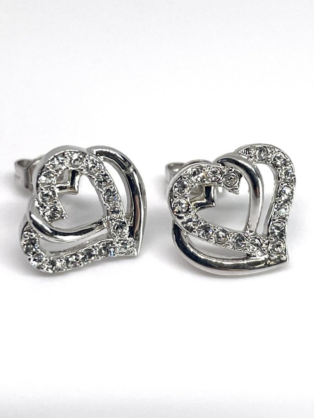 Entangled Heart Rhodium Plated Stud Earrings, made with Crystals by Swarovski